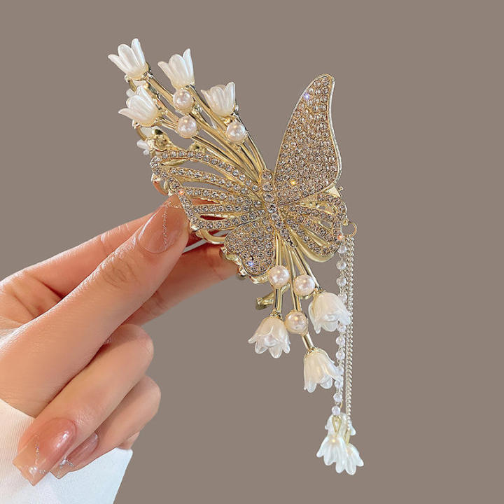 Large%20Butterfly%20Hair%20Claw%20Clips%20Gold%20Flower%20Lily%20of%20The%20Valley%20Violet%20Hair%20Claw%20Clips%20with%20Tassel%20Metal%20Pearl%20Nonslip%20Clamps%20Hair%20Styling%20Accessories%20for%20Thick%20Long%20Hair%20Women%20-%20Image%206