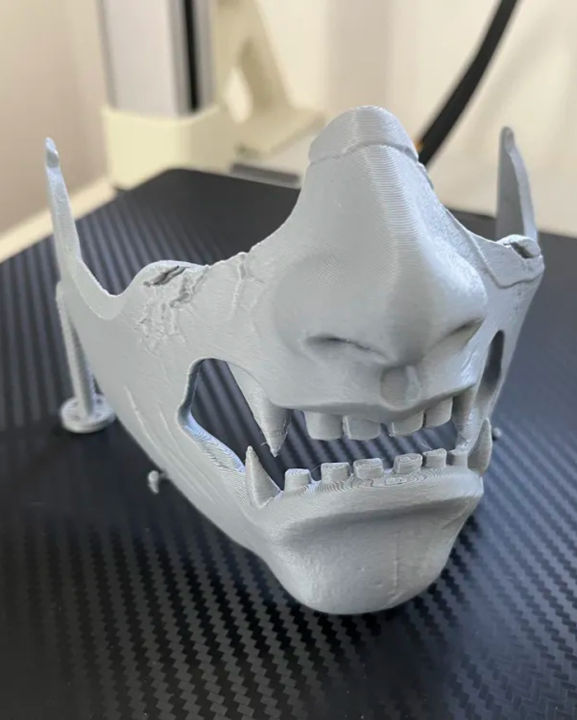 3D%20Printed%20Ghost%20of%20Yotei%20Atsu%20Mask%20PS5%20Controller%20Holder%20-%20DualSense%20Snap-In%20Stand%20with%20Smart%20Button%20Cutout%20for%20Gaming%20Desk%20Decor%20-%20Image%203