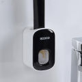 ECOCO Automatic Toothpaste Squeezers Wall Mounted Toothpaste Dispenser Dustproof Toothbrush Holder Bathroom Accessories for Home. 