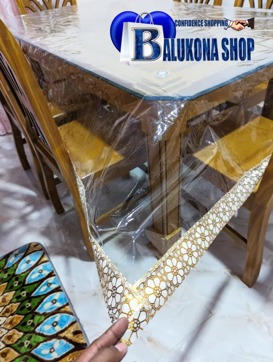 White%20Plastic%20Dining%20Table%20Cloth%20Cover%20With%20Border%20Design%20-%20Add%20A%20Touch%20Of%20Elegance%20To%20Your%20Dining%20Setup%20With%20This%20Stylish%20Table%20Cloth%20Cover%20-%20Image%204
