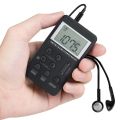 Mini Stereo AM/FM Pocket Radio Universal Dual Band Digital Display Mini Radio Receiver With HiFi Earphones Rechargeable Battery. 