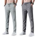 Xia Xiu thin ice silk casual pants men's work trend loose straight breathable sports cropped pants men.