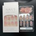 Nail art for men with 24 pieces of press-on nails in various designs. 