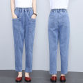 Fashionable mom jeans women's spring and summer harem radish pants high-waisted slim middle-aged casual women's cropped pants. 