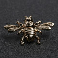 Golden bee brooch pin buckle for men women outfit fashion accessories.