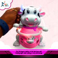 Battery operated Dancing Cute Cow Toy Swing hands & feet, Flashing light in horns  & Music. 