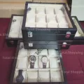 Safely store your watche Box in a 12-slot wooden clock box with leather finish, keeping your timepieces fashionable and maintained..