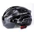 Factory wholesale bicycle helmet integrated magnetic goggles riding helmet mountain bike riding helmet tail light. 