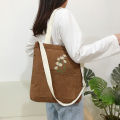 Little daisy corduroy women's single shoulder canvas bag Literature and art student make-up bag casual college style crossbody shopping bag.