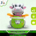 Battery operated Dancing Cute Cow Toy Swing hands & feet, Flashing light in horns  & Music. 