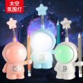 Cartoon Astronaut SpacemanLEDPencil Sharper Table Lamp Children's Eye Protection Bedside Lamp Ambience Light Seven-Color Night Light. 
