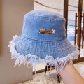 Fashionable Distressed Denim Fisherman Hat Women Washed Denim Bucket Cap with Tassel and Iron Label Outdoor Sun Protection Wide Brim.