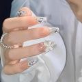 Xiaohongshu hand-worn nail nail pieces wholesale long diamond butterfly nail stickers finished nail patches jelly glue.
