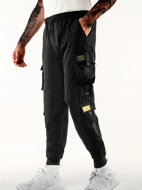 Workwear%20pants%20for%20men's%20spring%20and%20autumn%20styles%20with%20multiple%20pockets%20and%20ankle%20straps,%20casual%20and%20versatile%20cropped%20pants%20-%20Image%207