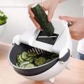 9 in 1 Wet Basket Vegetable Cutter - Multi-Function Vegetable Cutter with Drain Basket Magic Rotate Vegetable Cutter. 