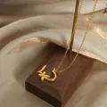 Cross border lines love butterfly flower design pendant necklace titanium steel gold plated earrings jewelry set wholesale. 