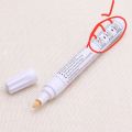 White Marker Pen, Permanent oil based fast drying marker.