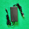 AC/DC Power Adapter Charger AC 100-240V to DC 12V 4A. 