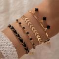 new jewelry sweet and cool style black diamond five-petal flower multi-layer bracelet set ins style bracelet four-piece set.