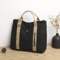 New cross-border women's bag, large capacity canvas handbag, simple casual shoulder bag, fashionable short-distance lightweight travel bag.