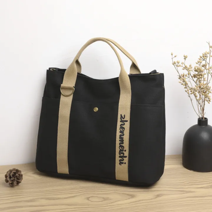 New%20cross-border%20women's%20bag,%20large%20capacity%20canvas%20handbag,%20simple%20casual%20shoulder%20bag,%20fashionable%20short-distance%20lightweight%20travel%20bag%20-%20Image%202