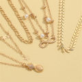 European and American stacking style fashion imitation pearl set anklets beach style star tassel pineapple pendant anklets 5 pieces. 