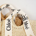 Alphabet silk scarf handpiece straw bag versatile semicircle weave women's bag women's seaside row vacation photo cross-body beach bag.
