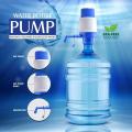 Manual Water Pump For Bottle - Easily Dispense Water From Bottles With This Manual Water Pump Dispenser - Providing Convenience For Your Home Or Office. 