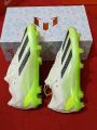Football boot with spikes semi high neck for indoor and outdoor games soccer. 