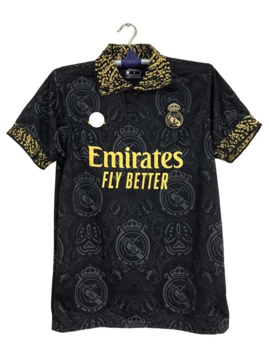 Real%20Madrid%20(With%20Embroidery)%20Premium%20Football%20Jersey%20Black%202023/24%20-%20Golden%20-%20Full%20Sleeve%20-%20Image%203