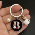 A-Z Letters Elegant Imitation Pearl Key Chain Charm Enamel 26 Letters Key Ring Qoddess. 