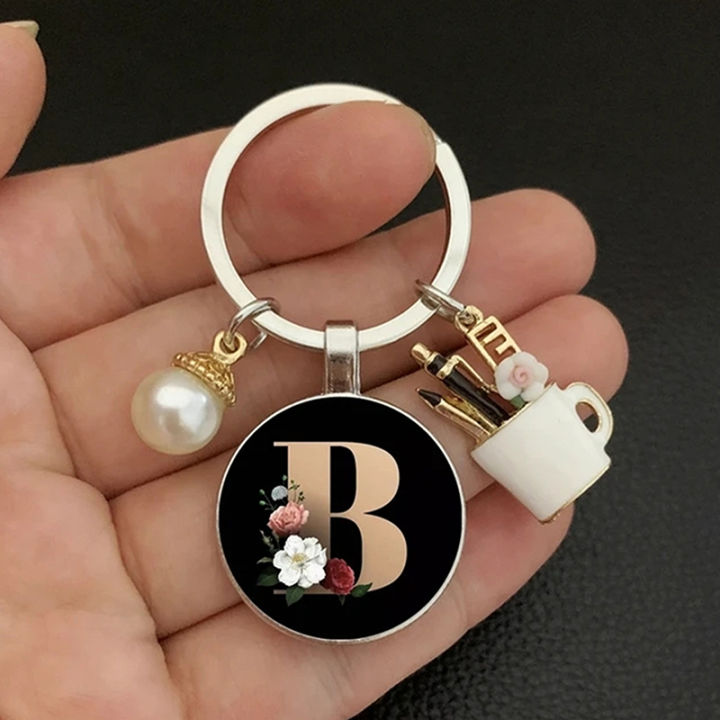 A-Z%20Letters%20Elegant%20Imitation%20Pearl%20Key%20Chain%20Charm%20Enamel%2026%20Letters%20Key%20Ring%20Qoddess%20-%20Image%202
