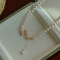 Bohemian Crystal Pearl Butterfly Necklace Vintage Y-Drop Fashion Choker Pendant Jewelry for Women and Girls.