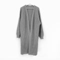 Korean version lazy wind pit strip long sweater women's coat 2023 new solid color loose balloon sleeve knitted cardigan tide. 