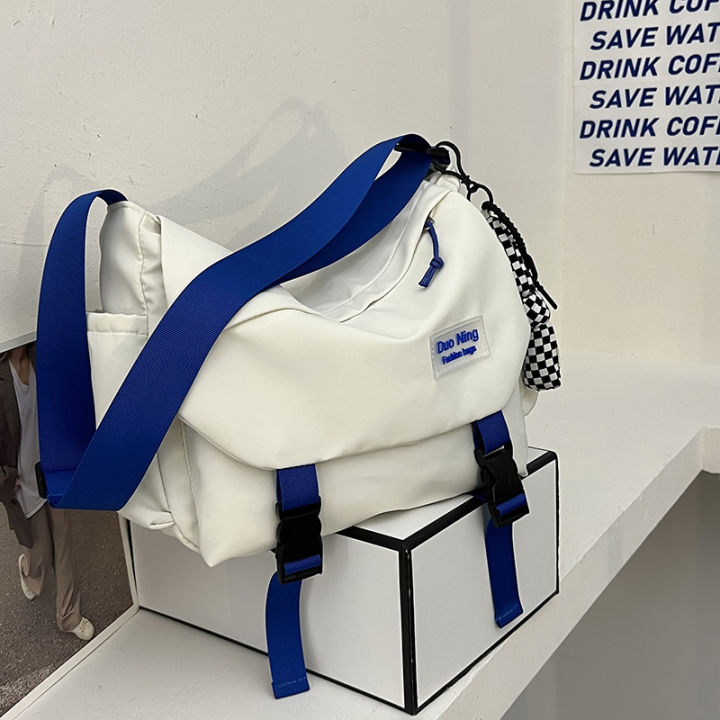 Bag women's 2022 spring korean version of the tide workwear style contrast nylon cloth bag simple high school student shoulder crossbody bag