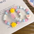 Sweet and Colorful Beaded Bracelet with Heart and Star Charms, Cute Gift for Girls Who Love Candy Colors Perfect Accessory.