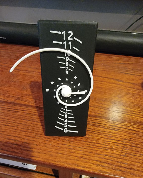 3D%20Printed%20Fibonacci%20Golden%20Spiral%20Clock%20-%20Unique%20Mathematical%20Timepiece%20with%20Ironed%20Marble%20Finish%20and%20Versatile%20Desk/Wall%20Mounting%20-%20Image%204