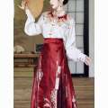 New Chinese style Hanfu heavy industry embroidery, cloud shoulder standing collar shirt, paired with woven gold horse face skirt, wedding engagement dress. 