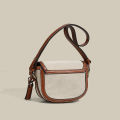 2024 New Korea ins niche contrast one-shoulder crossbody saddle bag Trendy retro versatile underarm bag for girls.