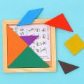 7pcs Wooden Tangram Brain Teaser Puzzle Children Mental Development Tangram Kids Educational Toy. 