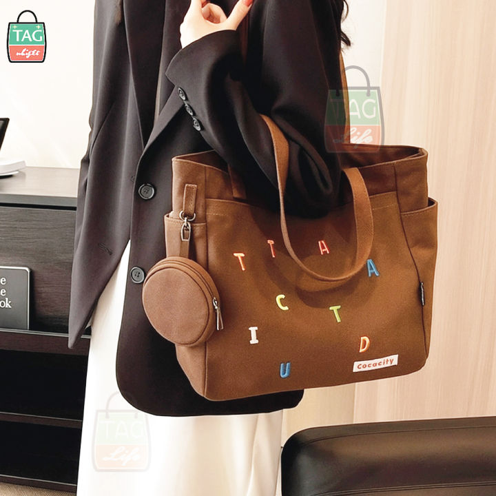 TAG%20Lifestyle%20Exclusive%20Alphabet%20Embroidery%20Design%20Canvas%20Tote%20Bag%20Sand%20Brown%20Color%20Fashionable%20Top%20Handle%20With%204%20Outside%20Pockets%20Trendy%20Fashionable%20Tote%20Bag%20for%20University,%20College%20Students%20Girls%20And%20Women%20With%20Free%20Pouch,%20Pencil%20Bag%20-%20Image%204