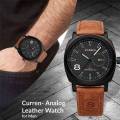 Current 8 Man leather analog watch for men.