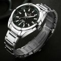 NAVIFORCE NF9038 - Silver Stainless Steel Analog Watch for Men - Silver & Black. 