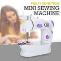 4 in 1 Electric Sewing Machines - White and Purple. 