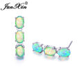 JUNXIN Luxury Oval Stone Blue White Fire Opal Earrings For Women Silver Color Green Purple Bar Stud Earrings Wedding Jewelry.