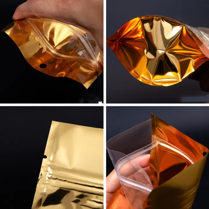 100Pcs%20Gold%20Aluminum%20Foil%20Clear%20Bag%20Zip%20Lock%20with%20Hang%20Hole%20Stand%20Up%20Tear%20Notch%20Reusable%20Food%20Nut%20Candy%20Packaging%20Pouches%20-%20Image%206