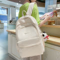 Niche simple backpack, female college student, junior high school student, girl, Japanese bubble lattice, high-value cream school bag. 