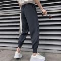 Korean Fashion Casual Suit Pants 2023 Spring New Men Slim Fit Classic Harem Pants Simple Wild Vintage Loose Solid Black Trousers. 
