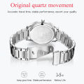 OLEVS 5567 Silver Stainless Steel Analog Watch For Men - White & Silver. 
