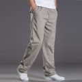 Mens casual Cargo Cotton pants men pocket loose Straight Pants Elastic Work Trousers Fit Joggers Male Super Large Size. 